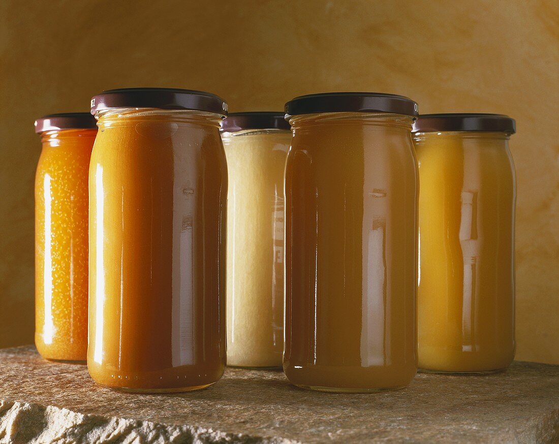 Various types of honey in screwtop jars
