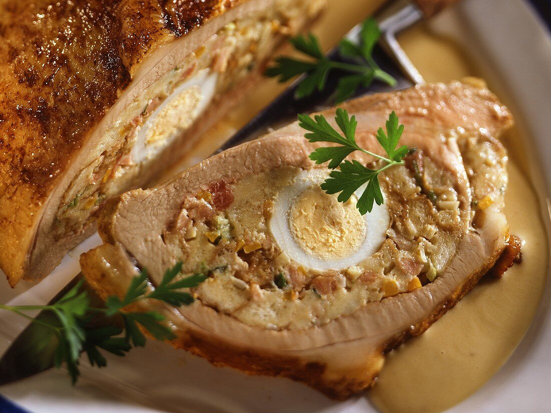 Veal breast with egg and bread stuffing, slices cut