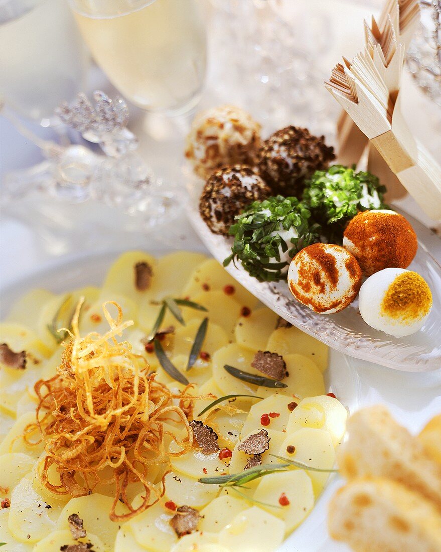 Potato carpaccio with truffle vinaigrette & cheese balls