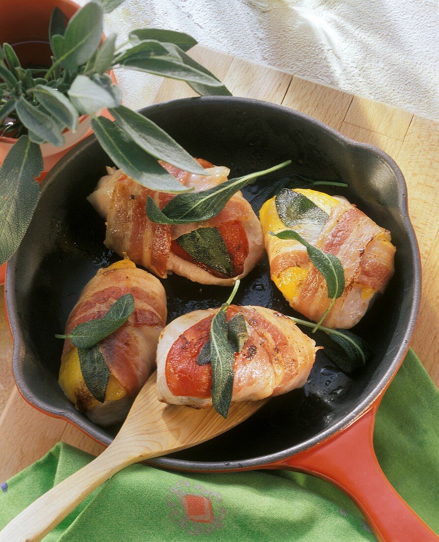 Turkey escalope wrapped in bacon with sage & peppers