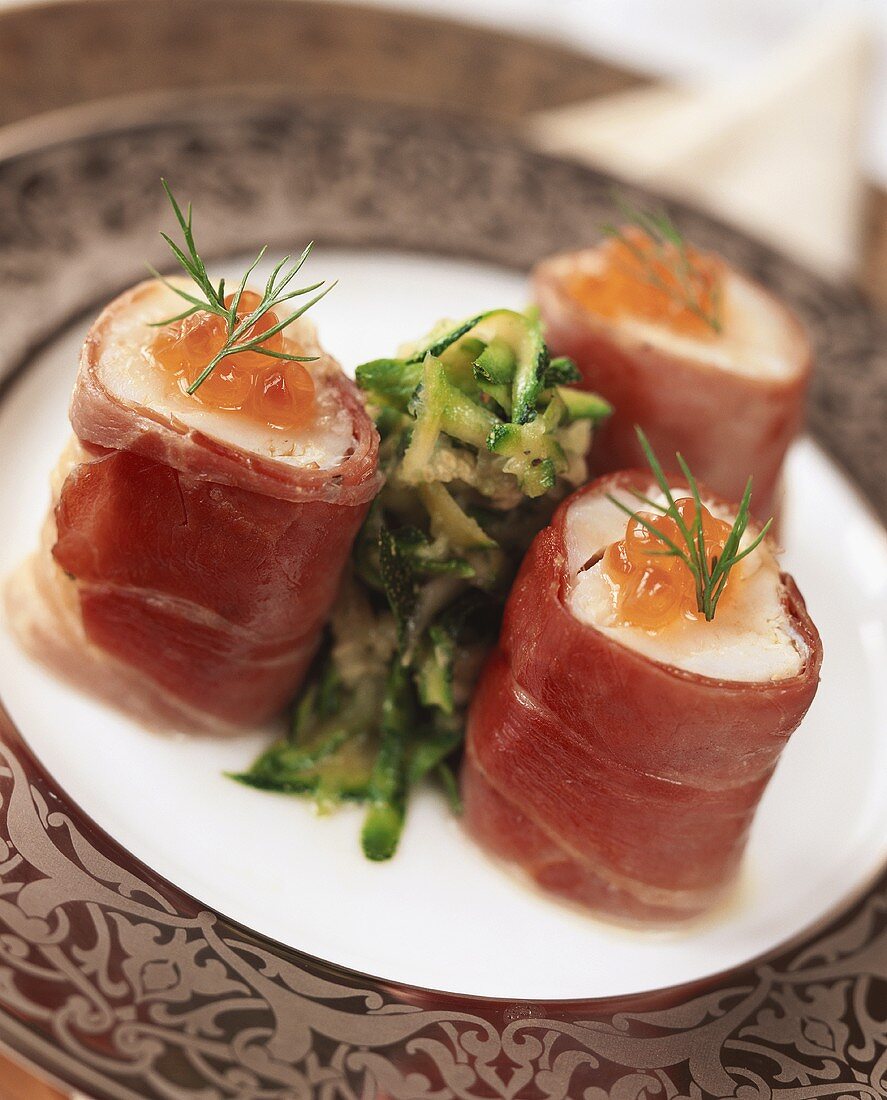 Pike-perch roll wrapped in ham with courgette relish