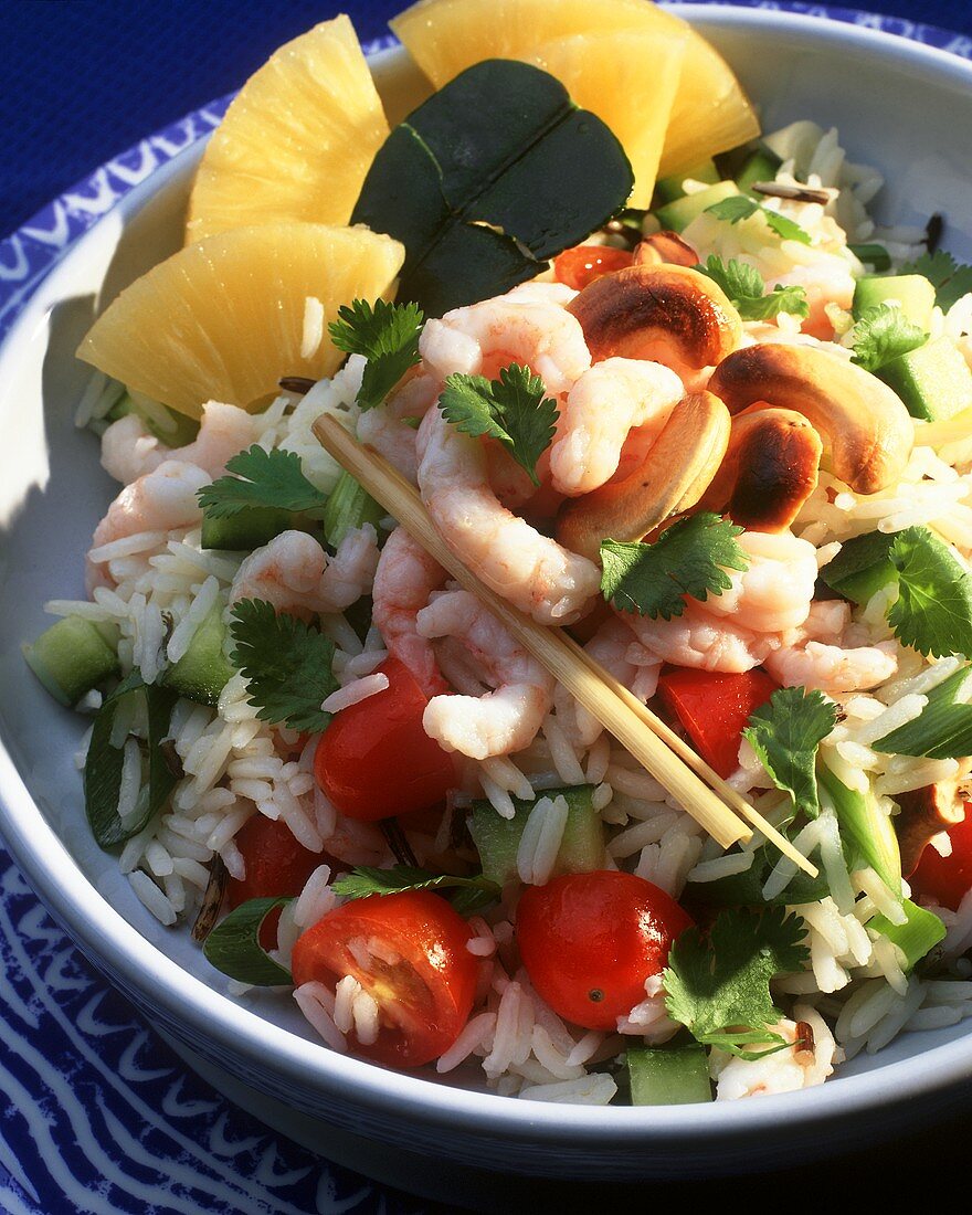 Rice salad with cashews, pineapple, cherry tomatoes & shrimps