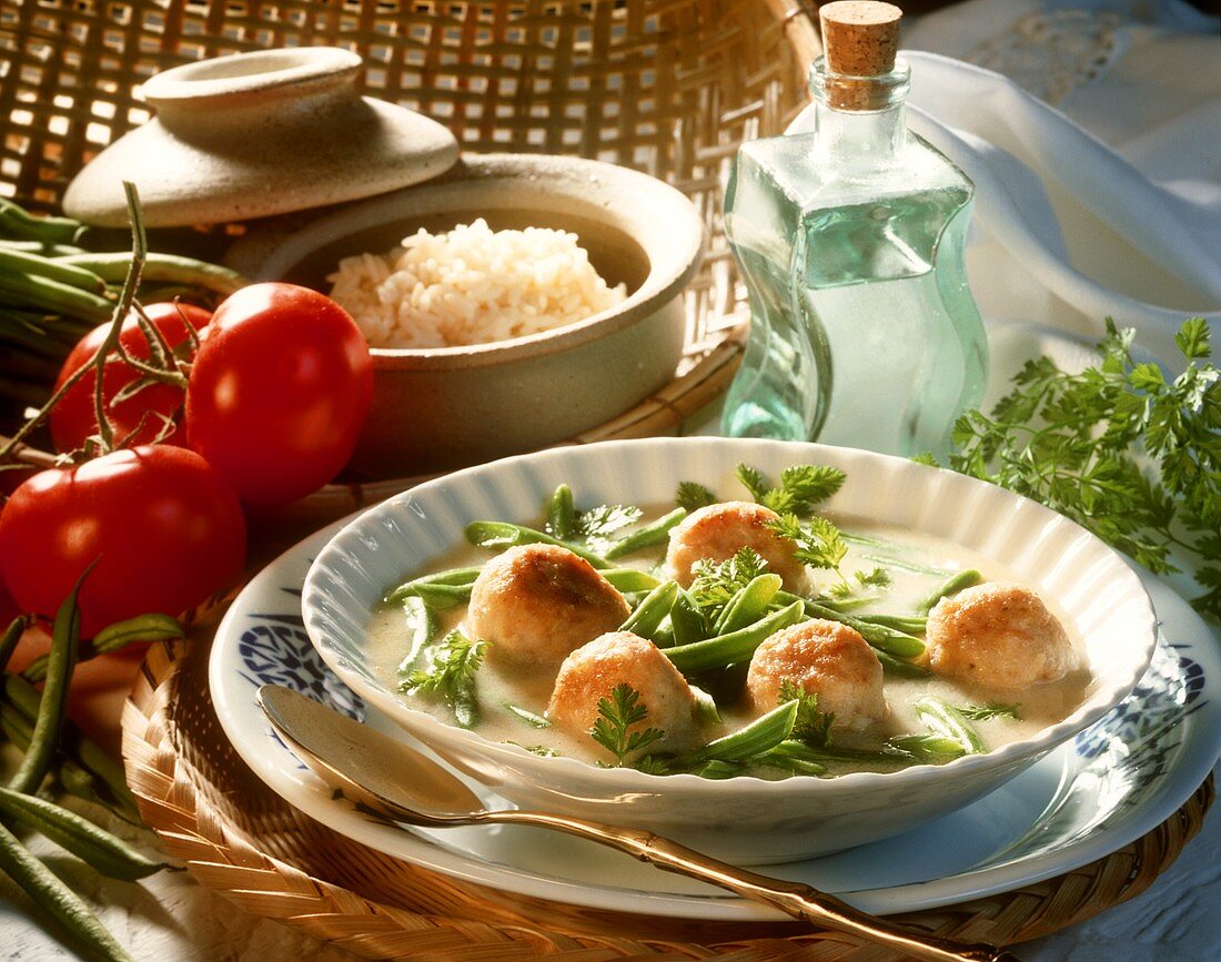 Chicken balls in chicken and coconut broth