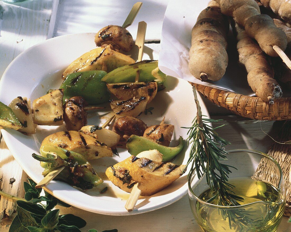 Grilled kebabs with vegetables and mushrooms