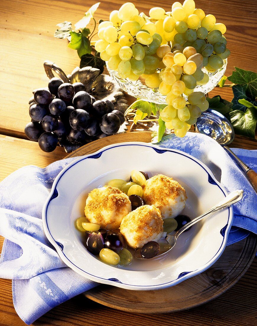 Potato and quark dumplings with grape compote