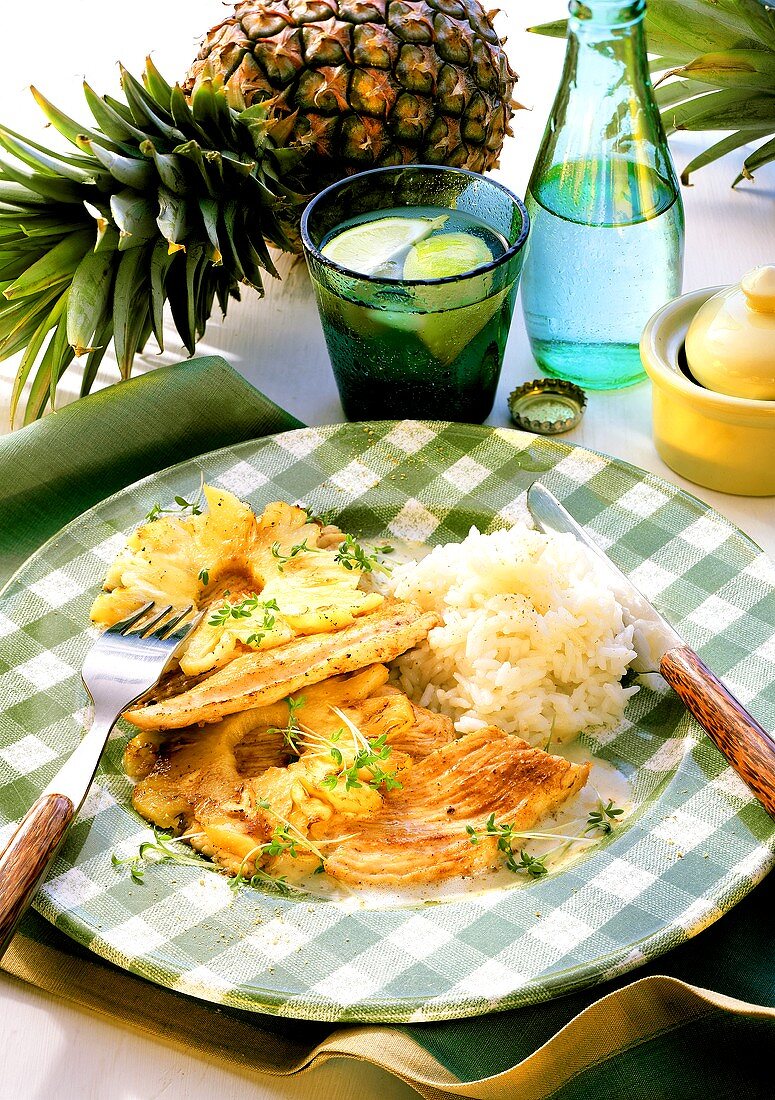 Putenschnitzel mit Ananas & Reis