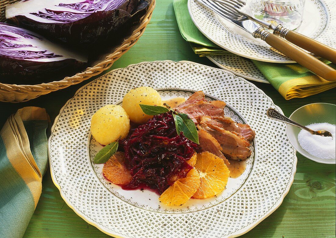 Duck breast with red cabbage and oranges