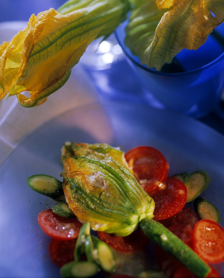 Courgette & tomato salad with stuffed courgette flowers