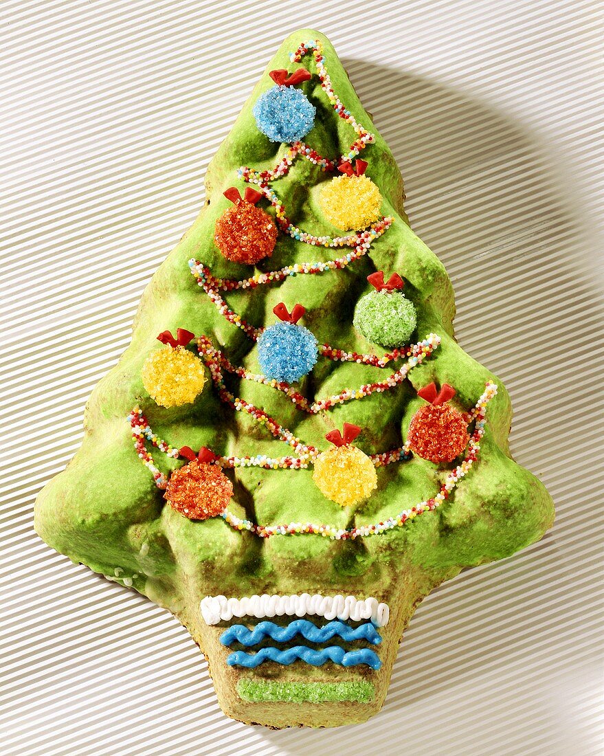 Baked fir tree with colourful baubles & tinsel
