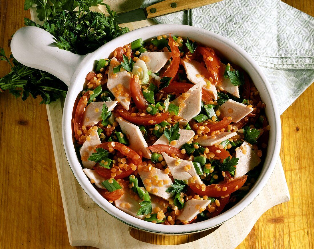 Sausage salad with lentils, tomatoes, parsley & onions