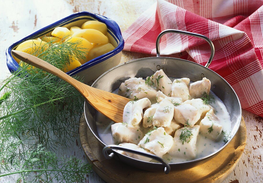 Cod with dill sauce and potatoes