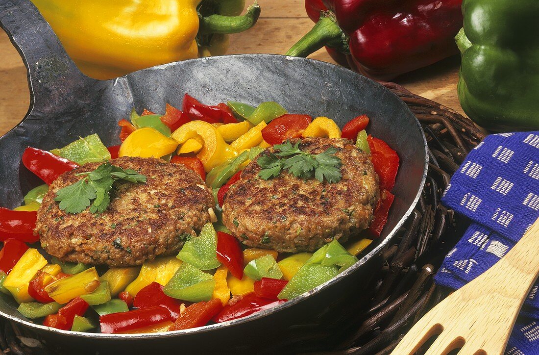 Frikadeller on peppers in the pan
