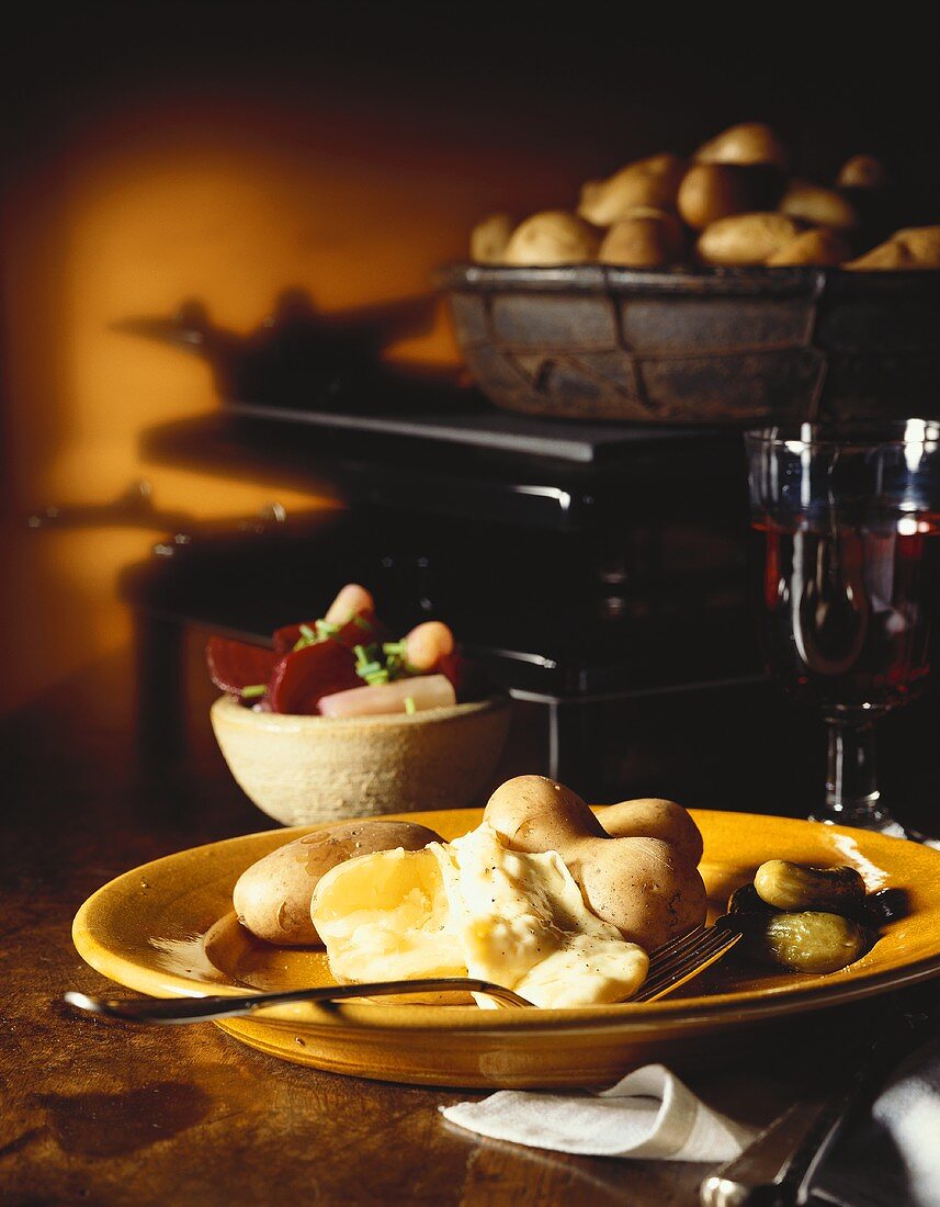 Raclette with potatoes cooked in their skins