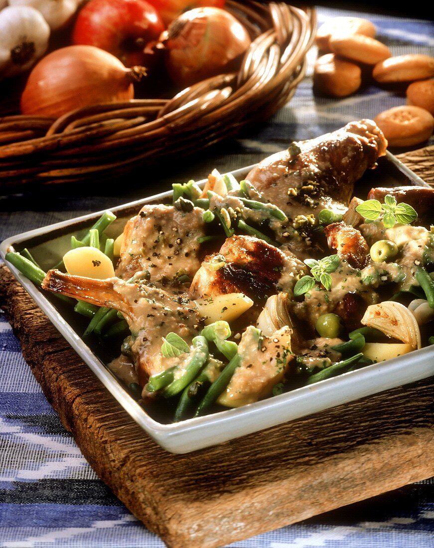 Rabbit with beans and butter biscuit & white wine sauce