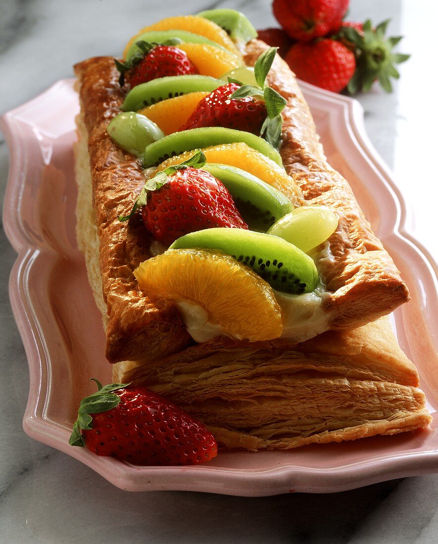Puff pastry slice with cream filling and fresh fruit