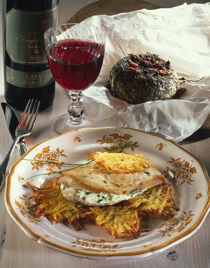 Chicken breast with sheep's cheese stuffing on potato rosti