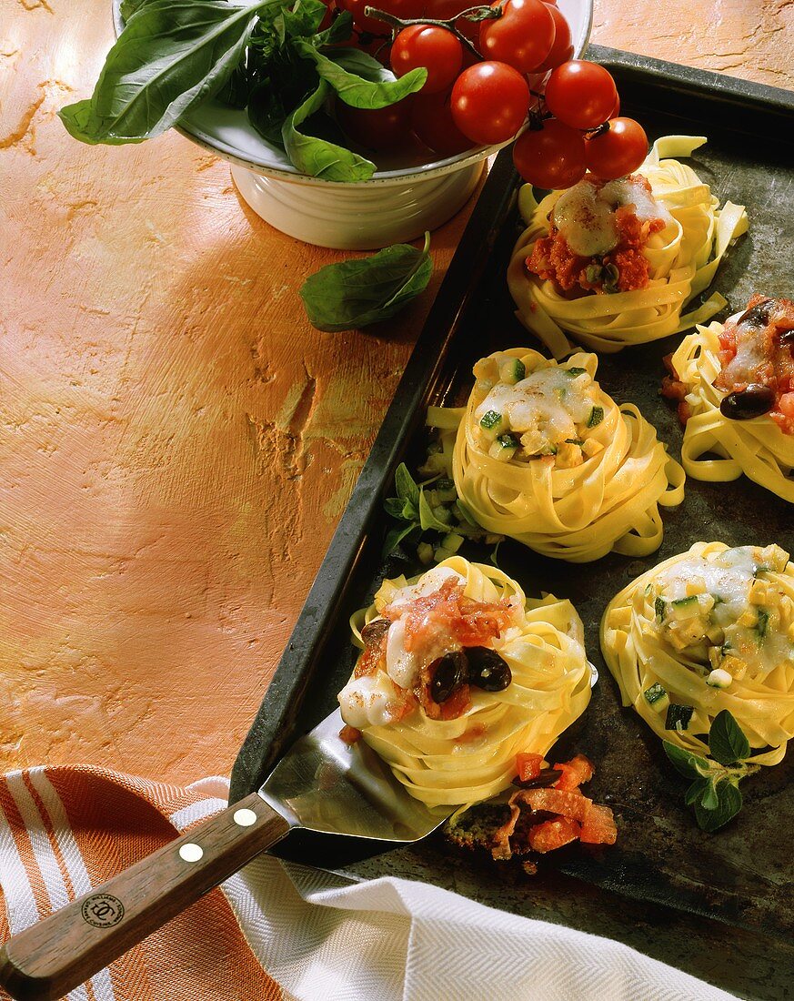 Oven-baked noodle nests au gratin