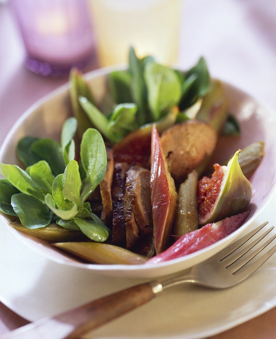 Corn salad with duck liver, figs and rhubarb