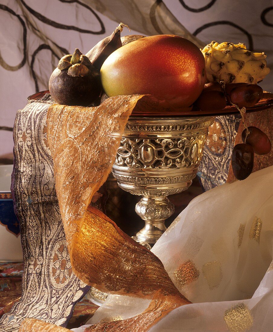 Decorative bowl of exotic fruit