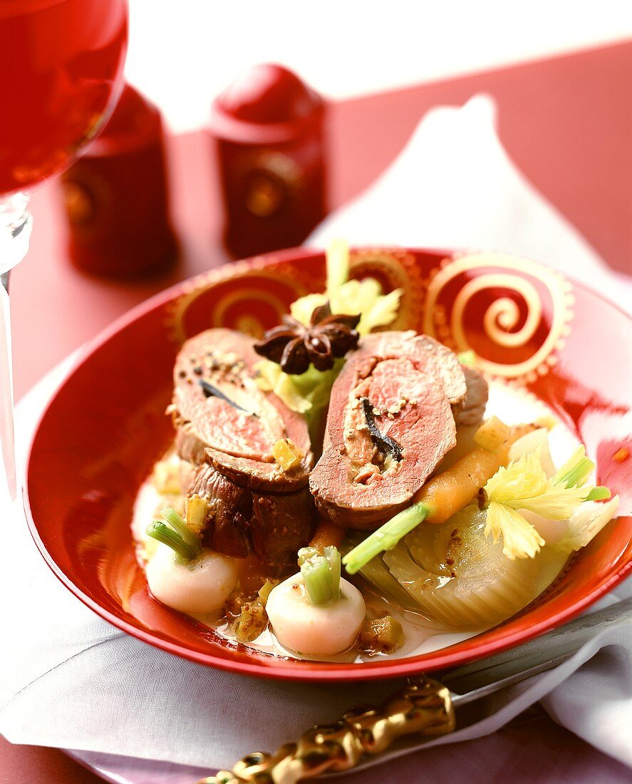 Duck breast with truffle & liver stuffing on vegetables