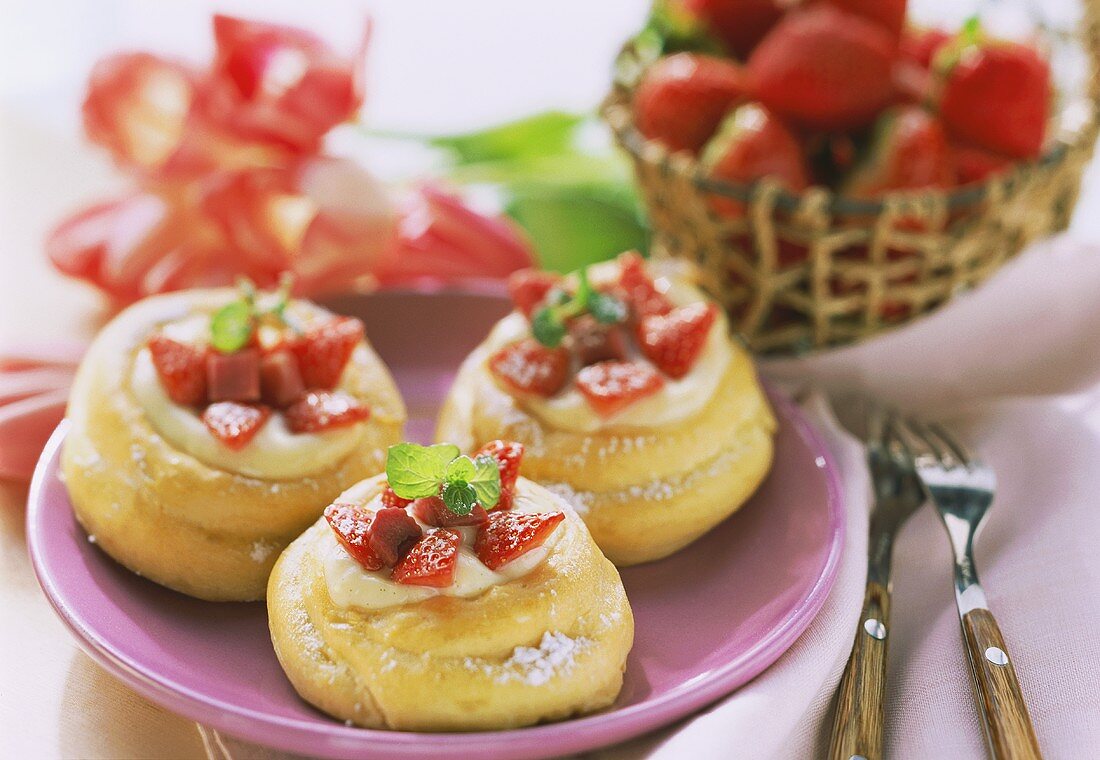 Filled cream puffs with vanilla mousse, strawberries & rhubarb