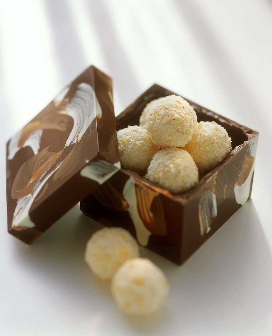 Coconut truffle in a chocolate box