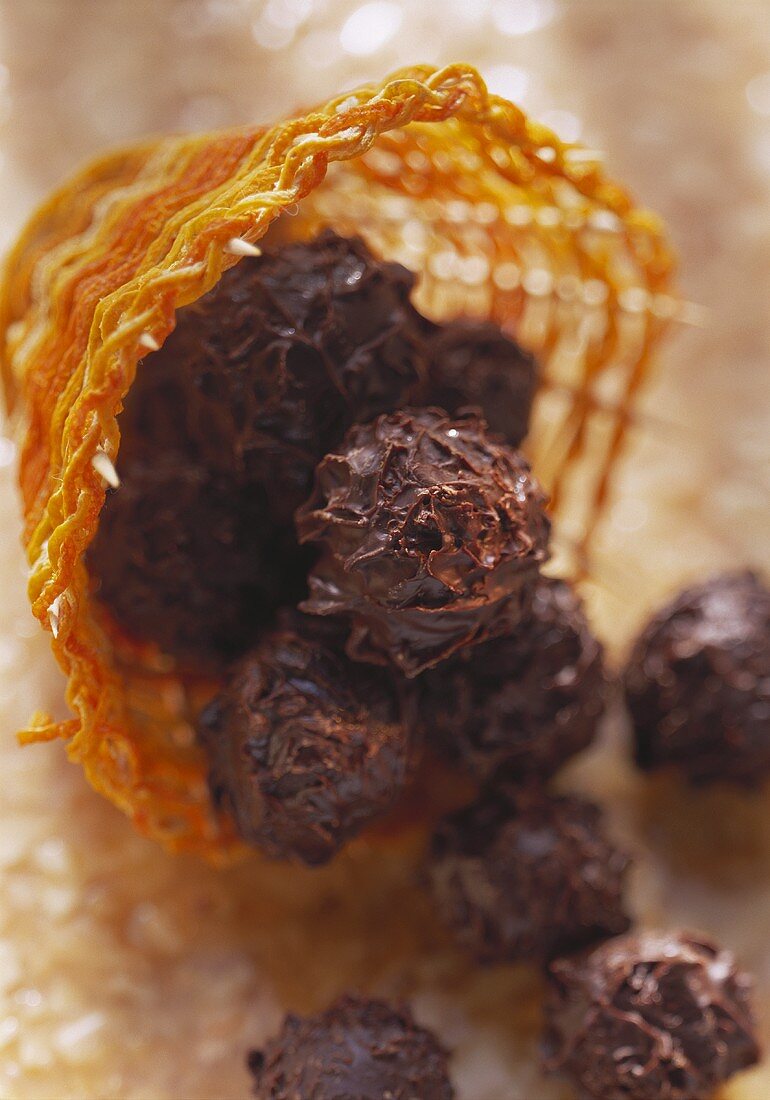 Chocolate truffles in raffia basket