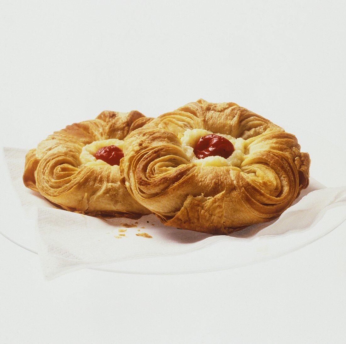Two puff pastries with blancmange & cherry filling