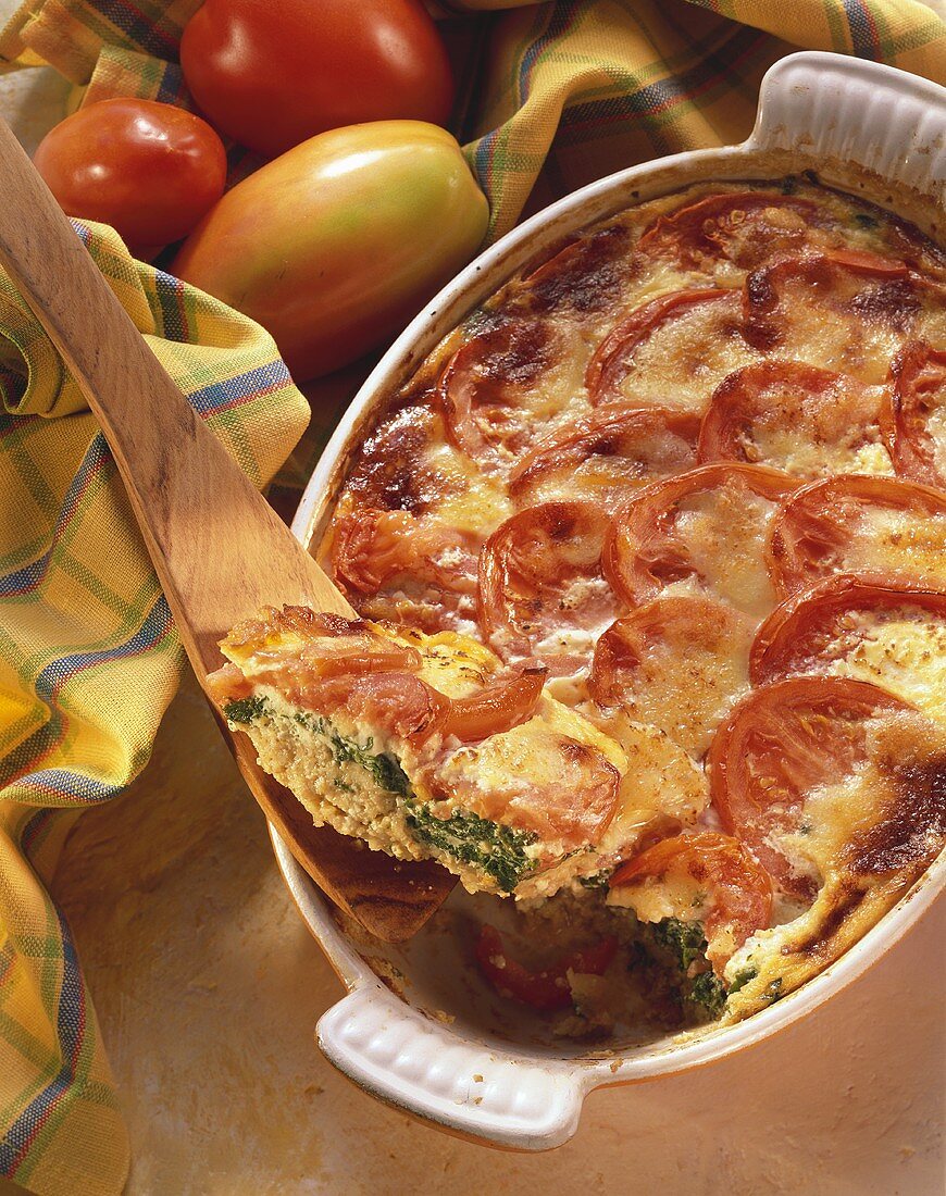 Green rye and spinach casserole with tomatoes