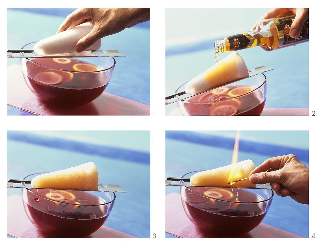 Fire tongs punch: melting the sugar loaf