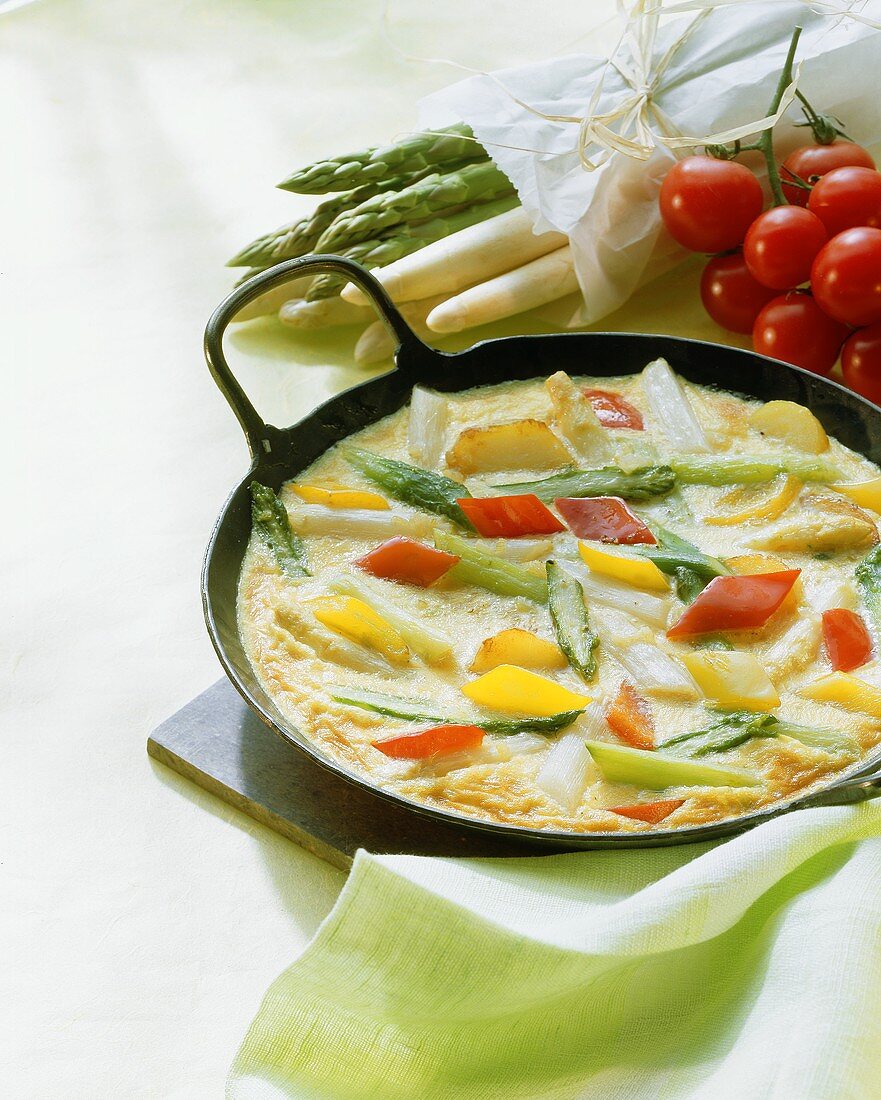 Asparagus frittata with potatoes and peppers