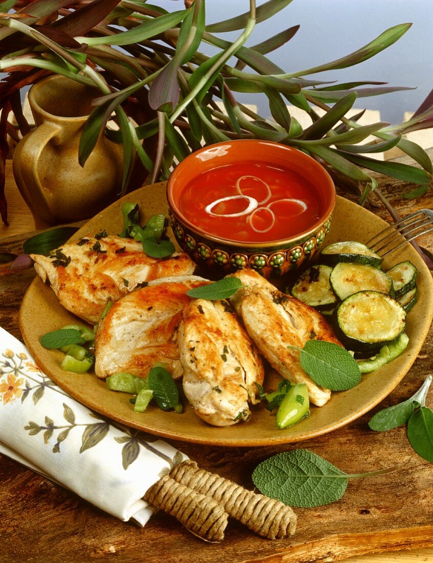 Barbecued chicken breast and courgettes with barbecue sauce