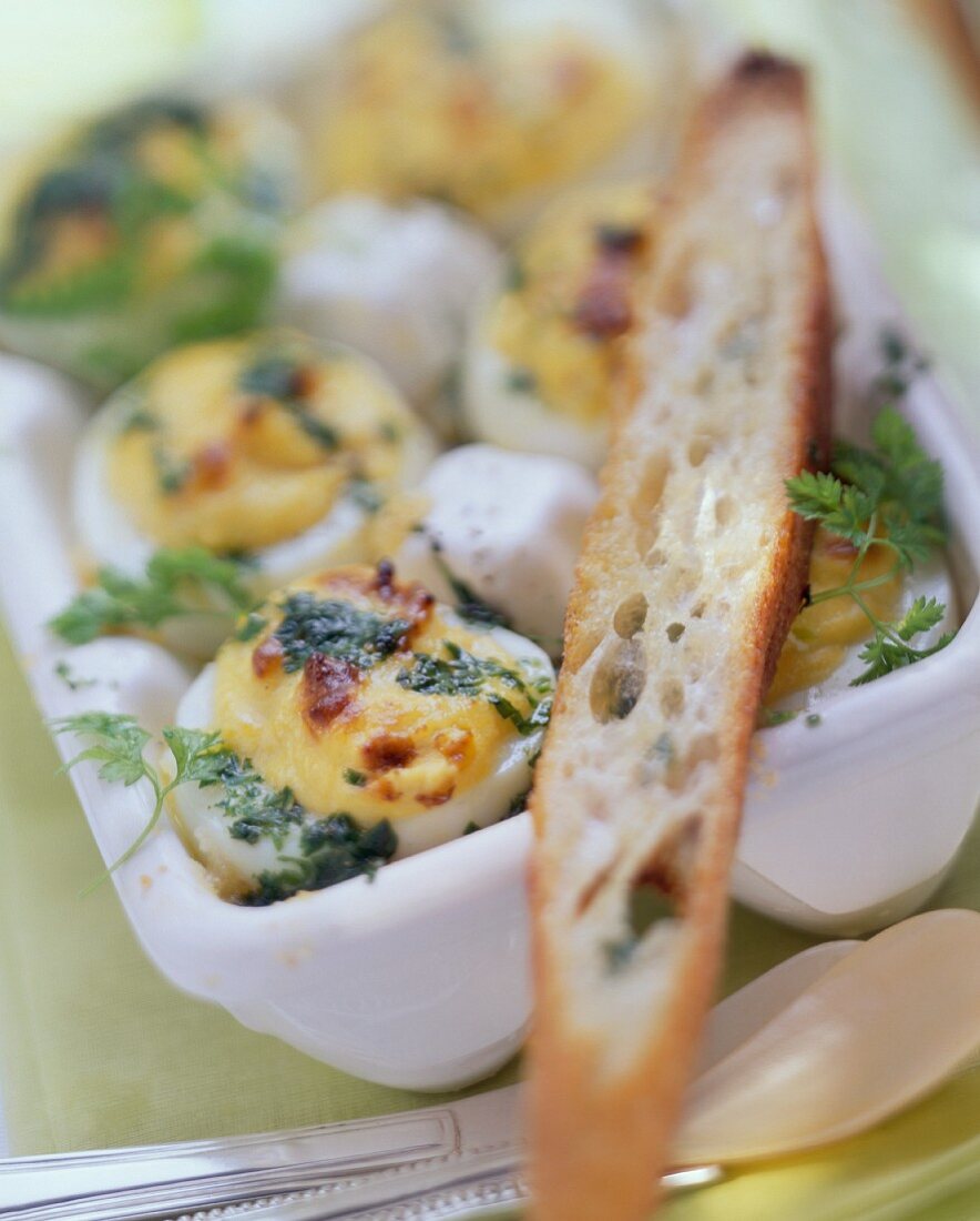 Oven-baked eggs with herbs