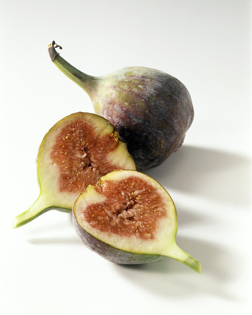 Halved and whole fig