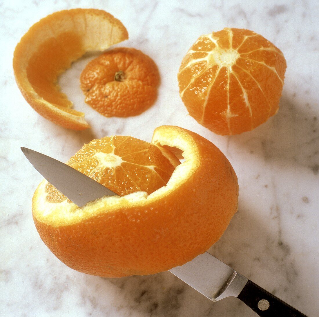 Thickly peeling an orange
