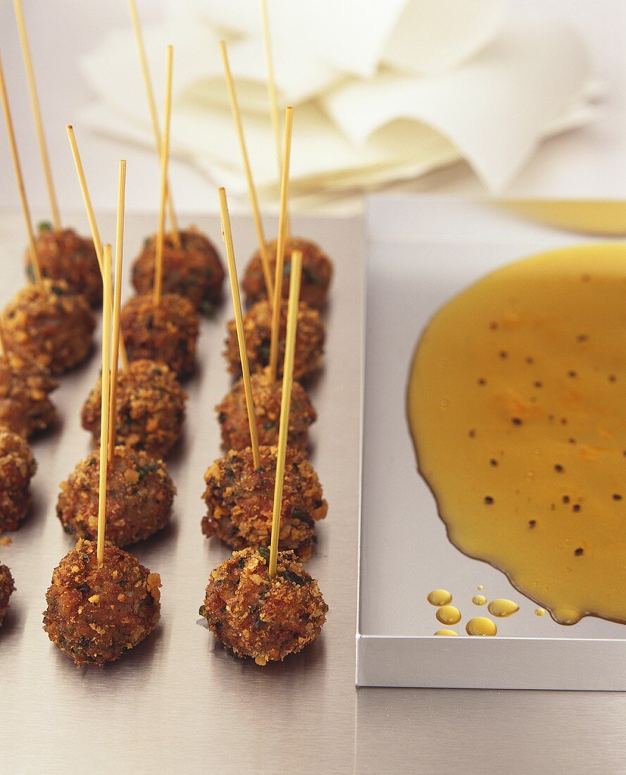 Herb mince balls on skewers