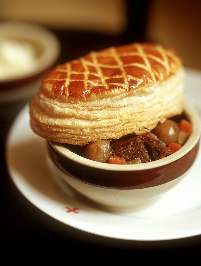 Beef stew with puff pastry topping