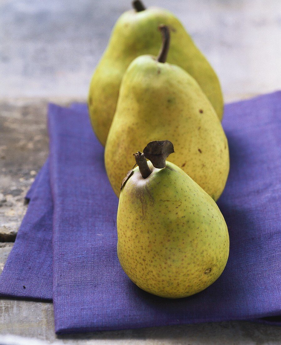 Three yellow pears