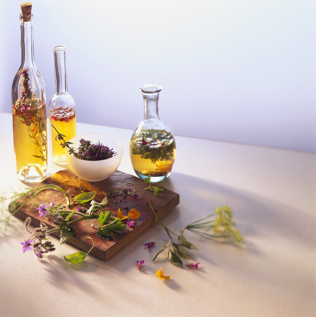 Still life with various types of vinegar & herbs