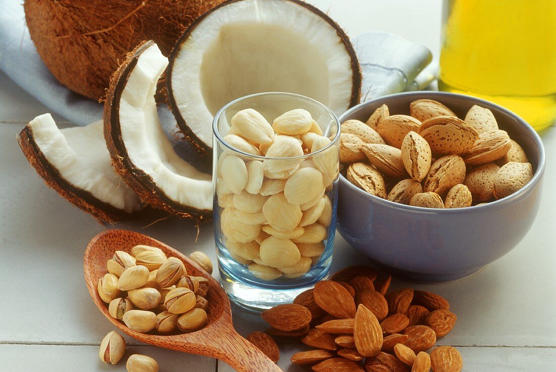 Still life with almonds, pistachios and coconuts