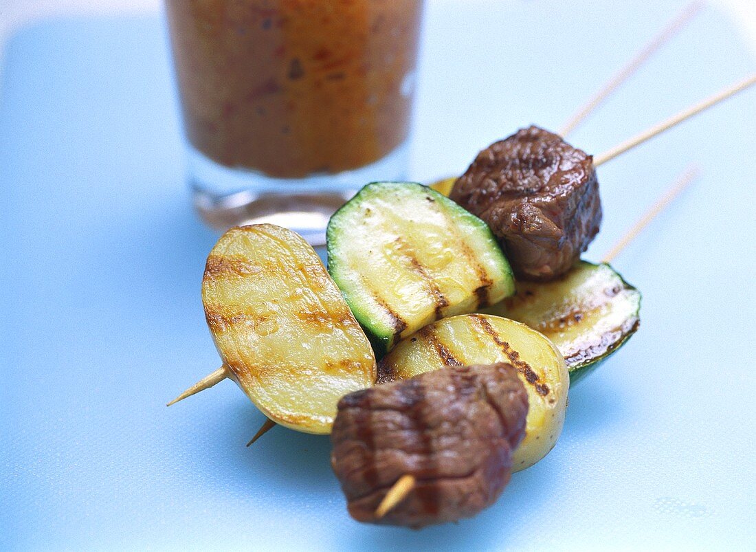 Ostrich meat & vegetable kebabs with almond & paprika dip