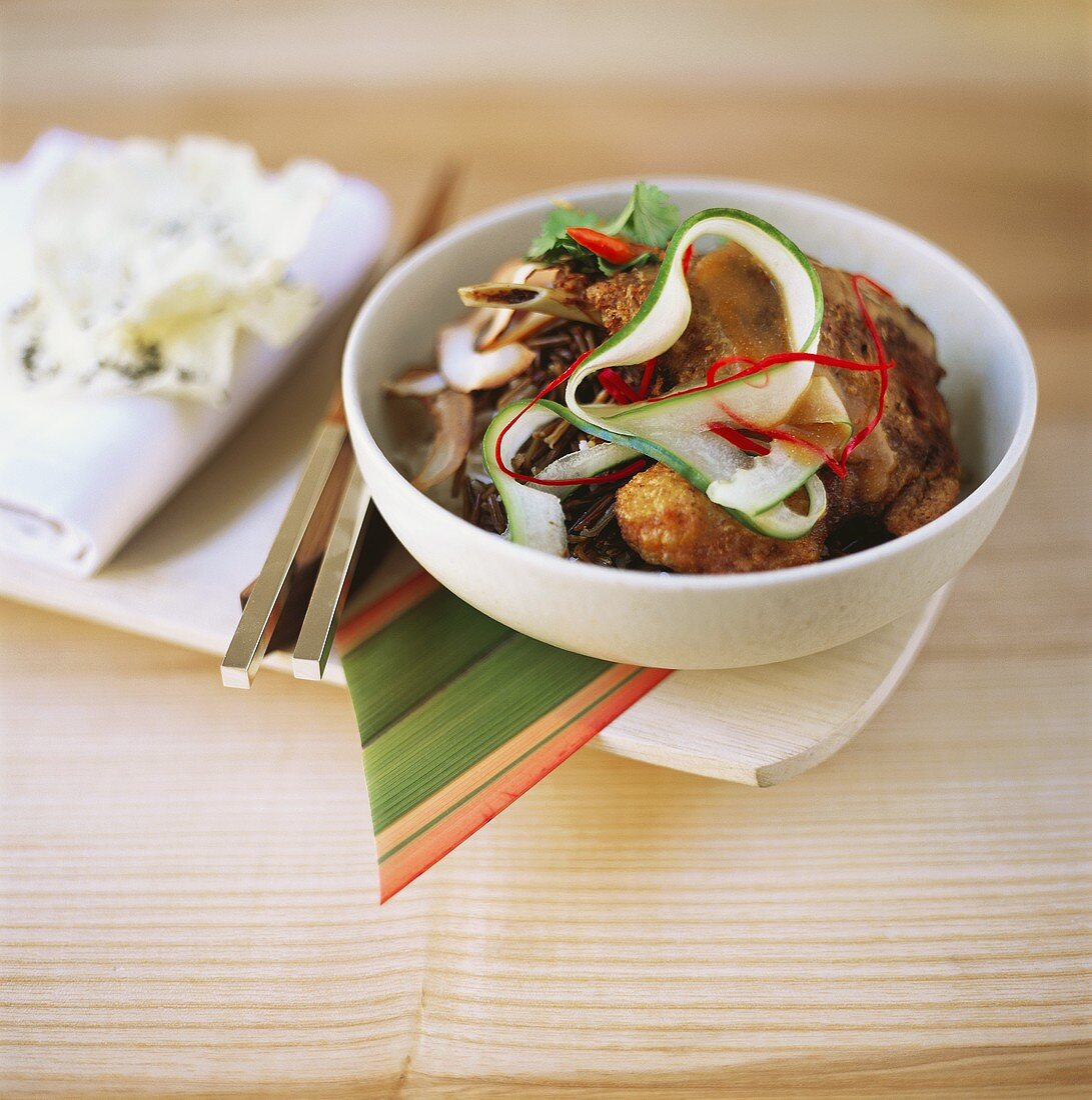 Chicken with courgette and chili on wild rice