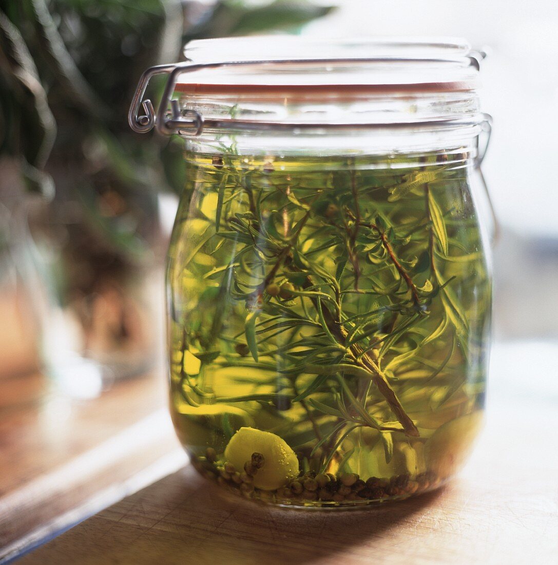 Rosemary oil in a preserving jar