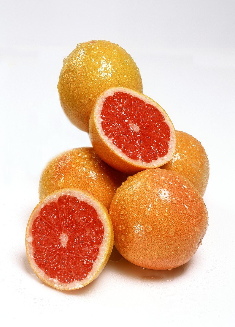 Grapefruits with drops of water