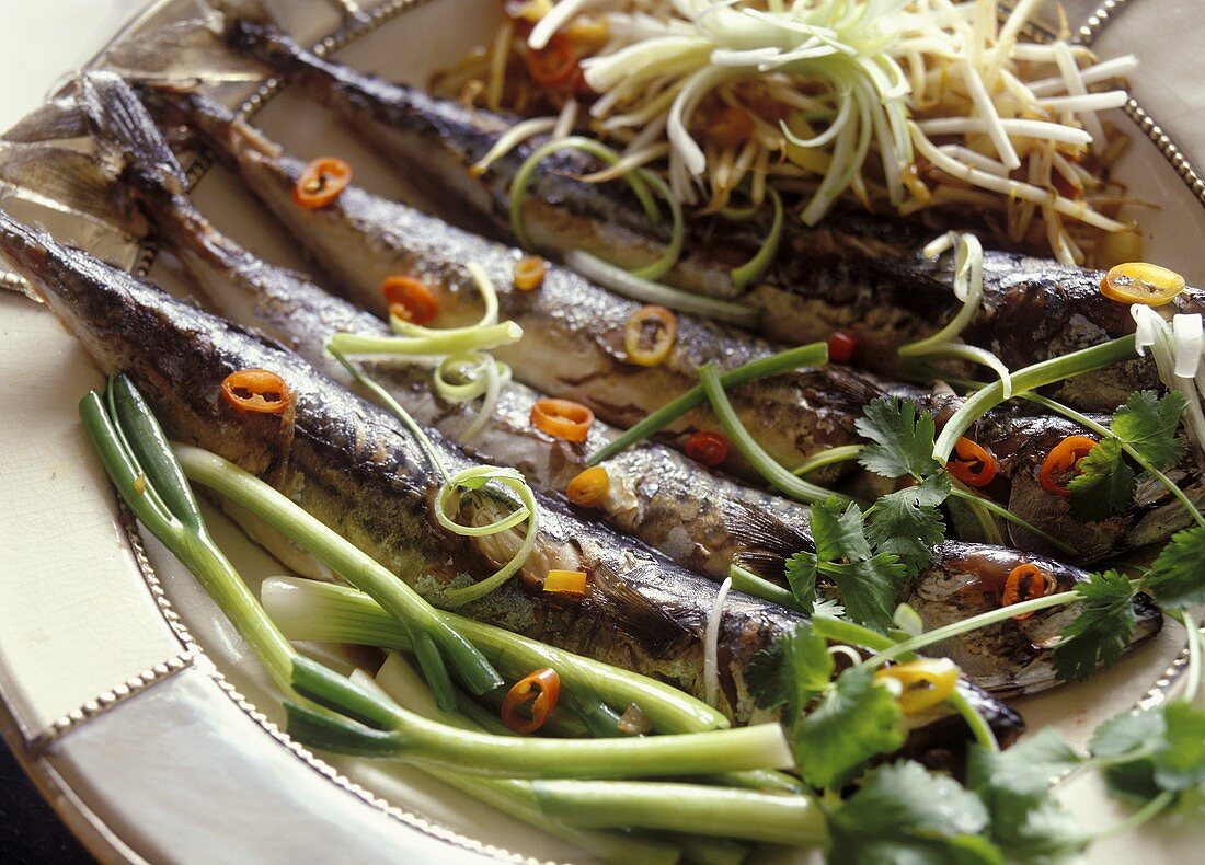 Fried sardines with spring onions