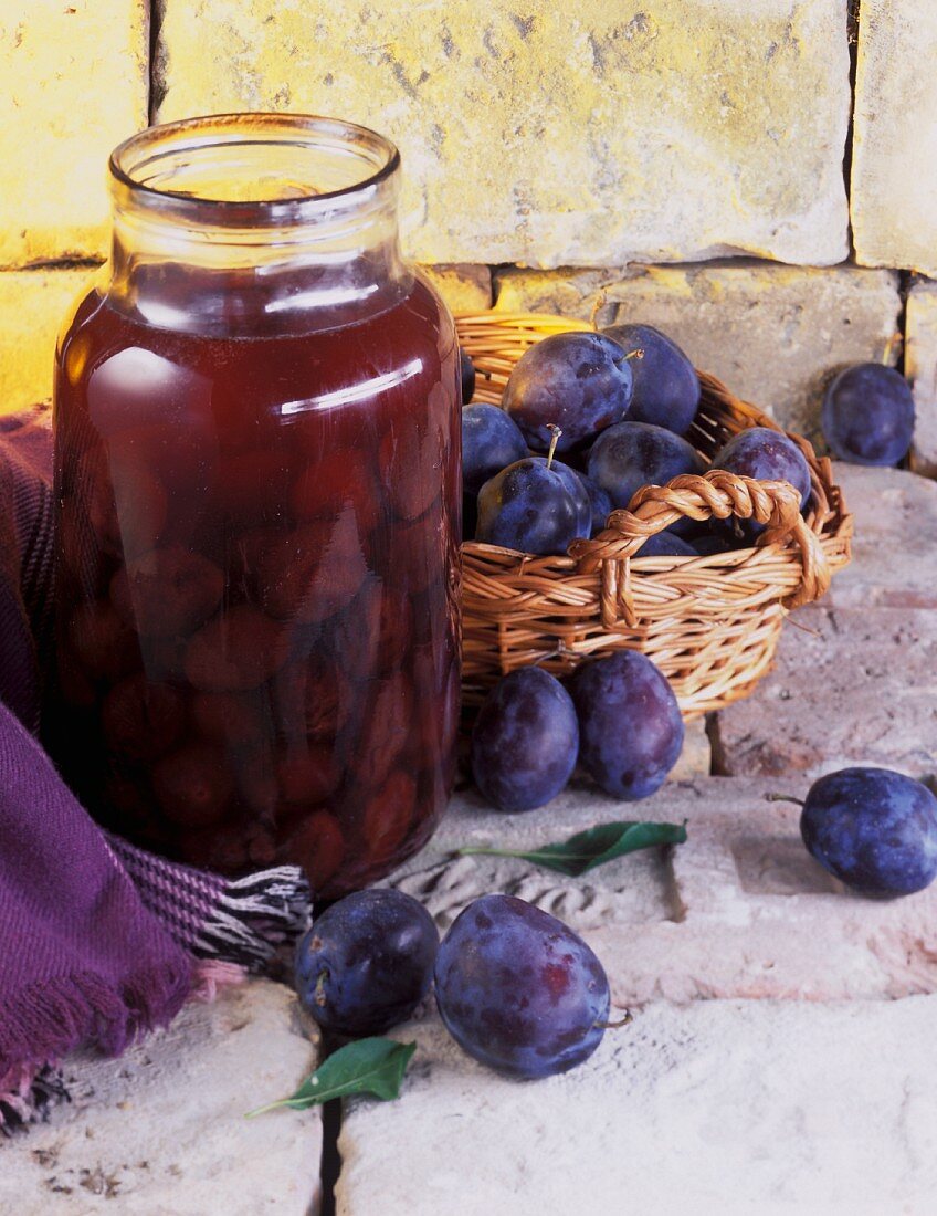 Bottled and fresh plums
