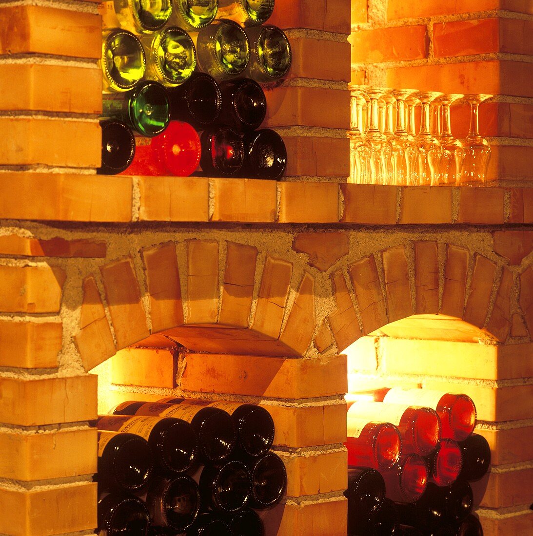 Wine bottles and wine glasses in wine rack