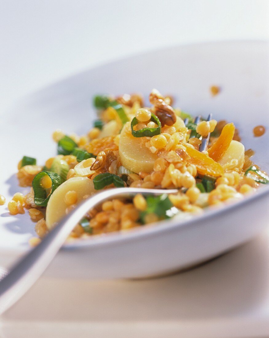 Lentil salad with potatoes and dried apricots