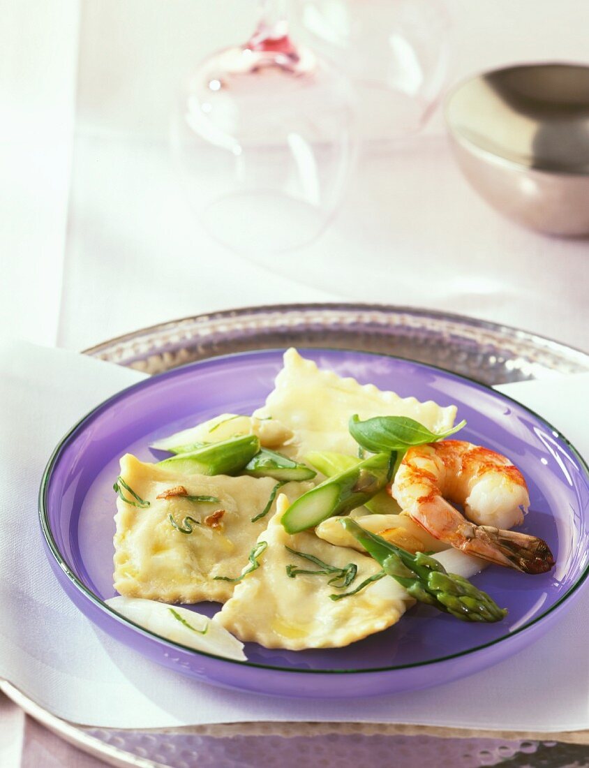 Ravioli with asparagus filling and shrimps