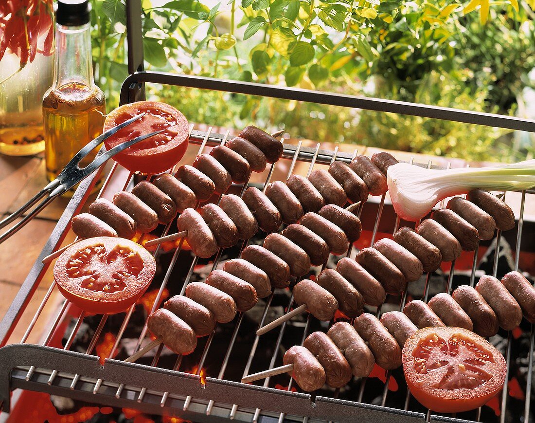 Sausage kebabs on the barbecue